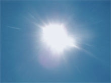 When selecting clothing for your child to wear outdoors, choose light-weight, tight-weave materials; these will help to keep them cool whilst still blocking the majority of ultraviolet (UV) radiation. Image: Kulshrax on Wikimedia Commons
